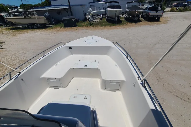 Slide: The Image of 2001 Century 2201 Bay Boat interior view at a boatyard. - 4