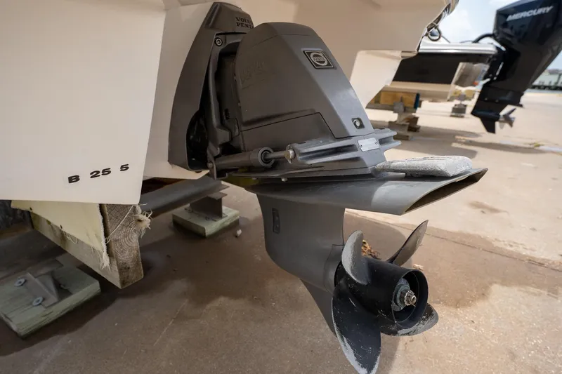 Slide: The Image of Close-up of a 2008 Regal 2000 Bowrider boat's outboard motor on a trailer. - 12