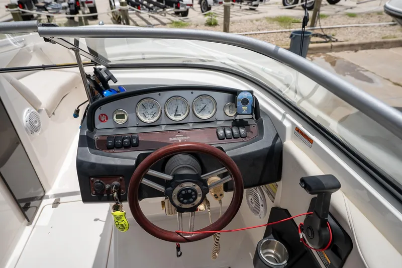 Slide: The Image of 2008 Regal 2000 Bowrider dashboard with steering wheel and instrument panel. - 21