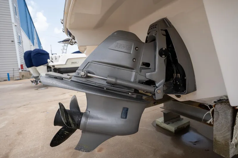 Slide: The Image of 2008 Regal 2000 Bowrider boat with Volvo Penta outdrive, docked on a sunny day. - 13
