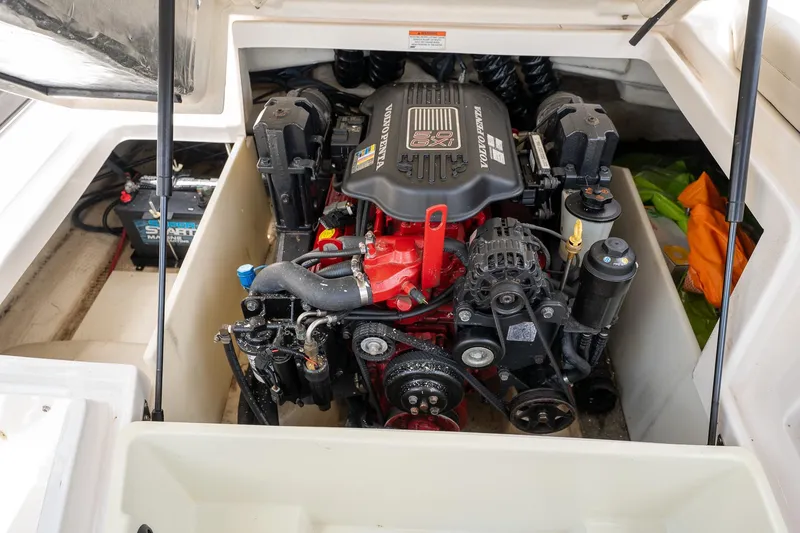 Slide: The Image of Engine compartment of a 2008 Regal 2000 Bowrider boat, featuring a Volvo Penta engine. - 28