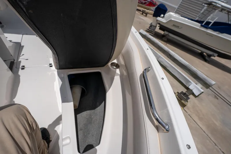 Slide: The Image of 2008 Regal 2000 Bowrider interior with seating and storage compartment. - 30