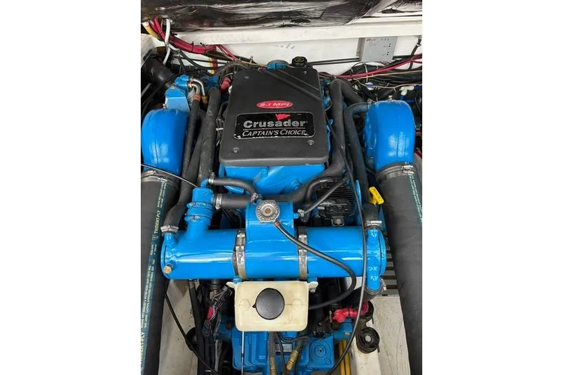 Slide: The Image of Engine of a 2001 Tiara Yachts 3100 Open, featuring Crusader Captain's Choice. - 27