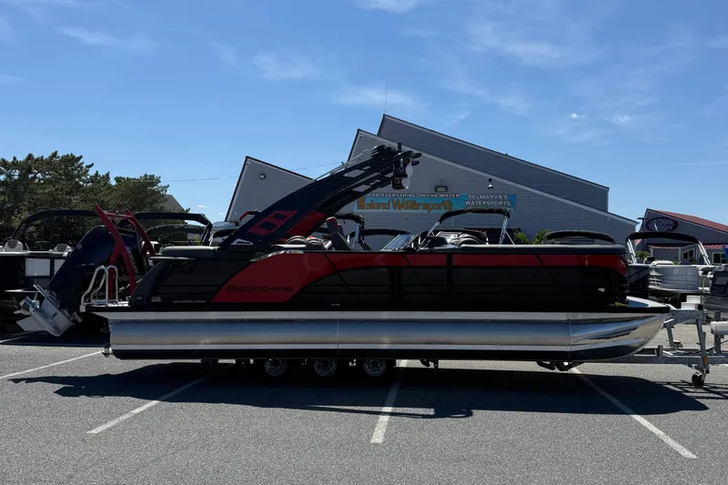 The Image of 2026 Berkshire 23RFX STS pontoon boat parked outdoors on a sunny day. - 1