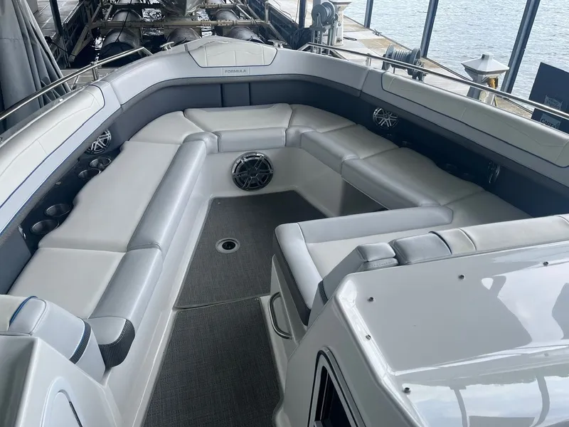 Slide: The Image of The image shows the spacious cockpit of a 2019 Formula 350 Crossover Bowrider with sleek seating. - 14