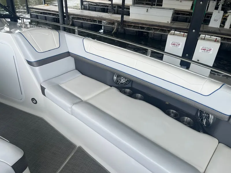 Slide: The Image of The image shows the cockpit of a 2019 Formula 350 Crossover Bowrider with sleek white upholstery. - 12