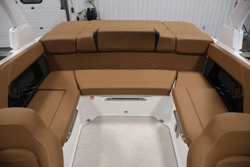 Slide: The Image of Luxurious seating area in 2026 Four Winns H4 boat with tan upholstery. - 32