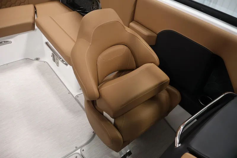 Slide: The Image of Luxurious interior seating of 2026 Four Winns H4 boat, featuring tan upholstery and modern design. - 31
