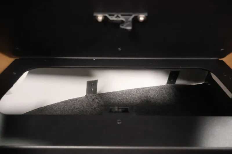 Slide: The Image of Open storage compartment in 2026 Four Winns H4 boat, showcasing interior space. - 29