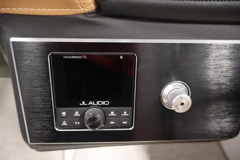 Slide: The Image of JL Audio MediaMaster 55 control panel in 2026 Four Winns H4 boat interior. - 22