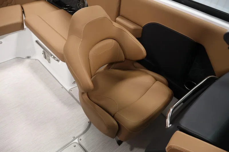 Slide: The Image of Luxurious tan seating in 2026 Four Winns H4 boat interior. - 30