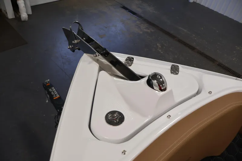 Slide: The Image of Bow of 2026 Four Winns H4 boat with anchor and sleek design. - 11