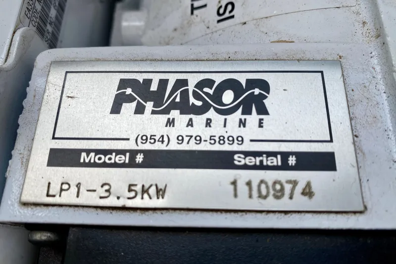 Slide: The Image of Phasor Marine generator label, model LP1-3.5KW, serial number 110974, for Mainship Pilot 34. - 51
