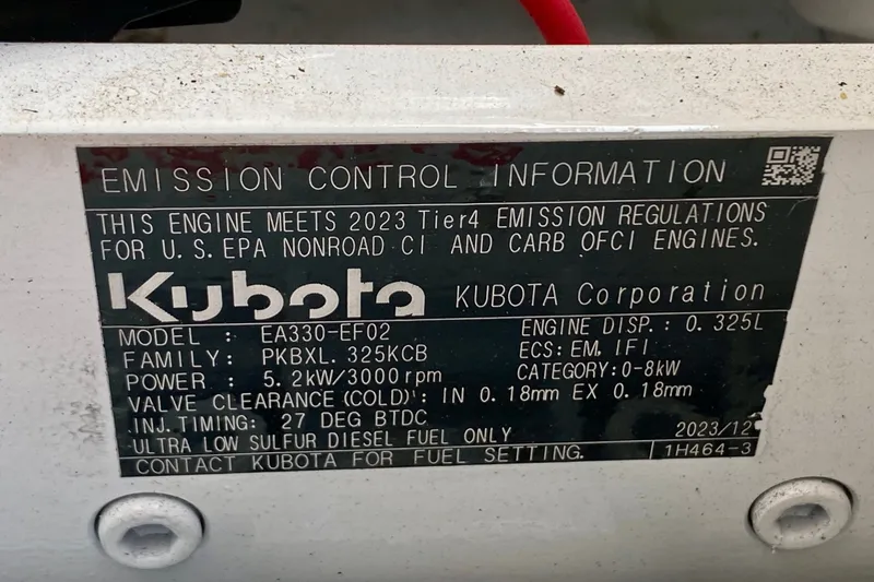 Slide: The Image of Emission control information label for Kubota engine on 2002 Mainship Pilot 34 boat. - 50