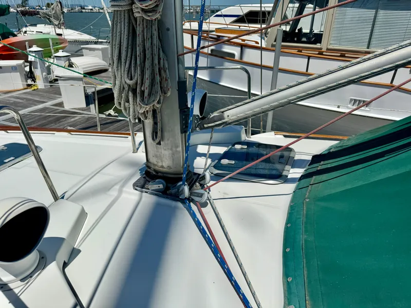 Slide: The Image of Beneteau Oceanis 40 CC sailboat deck, 1996 model, featuring rigging and green canopy. - 24