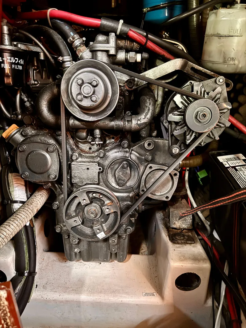Slide: The Image of Engine of 1996 Beneteau Oceanis 40 CC sailboat, detailed view with belts and components. - 20