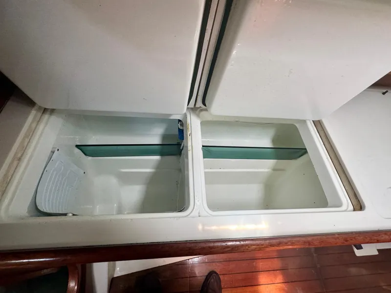 Slide: The Image of Open storage compartments on 1996 Beneteau Oceanis 40 CC yacht interior. - 13