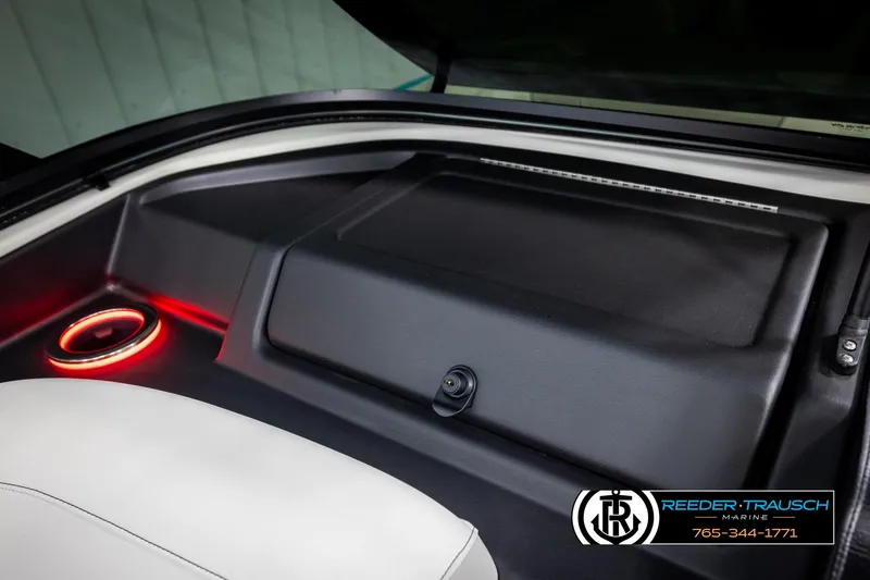 Slide: The Image of Interior of 2025 Avalon 2585 Excal VRBW with illuminated cup holder and sleek design. - 49