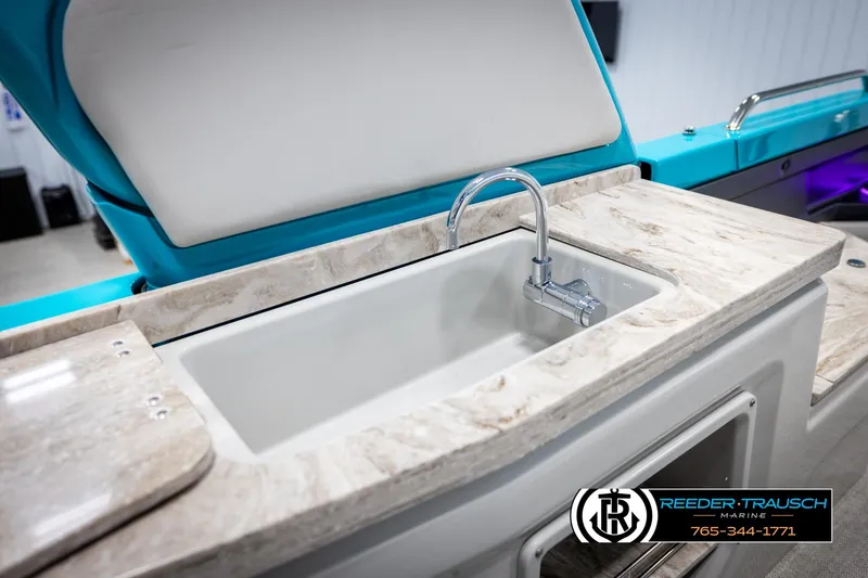 Slide: The Image of Luxury sink on Avalon 2585 Excal VRBW 2025 boat, featuring marble countertop and modern faucet. - 37