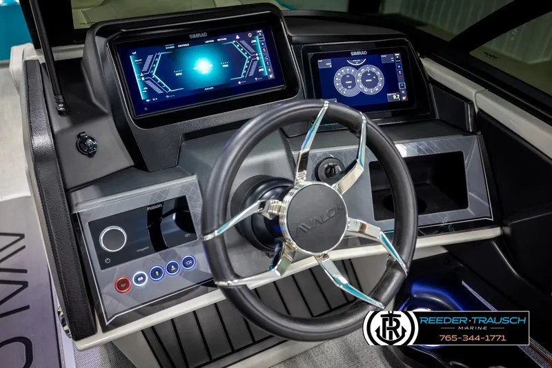 Slide: The Image of Steering console of 2025 Avalon 2585 Excal VRBW with advanced digital displays. - 42