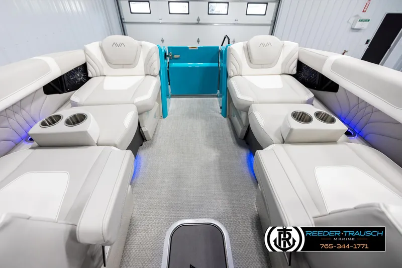 Slide: The Image of Luxurious interior of 2025 Avalon 2585 Excal VRBW boat with plush seating and cup holders. - 24
