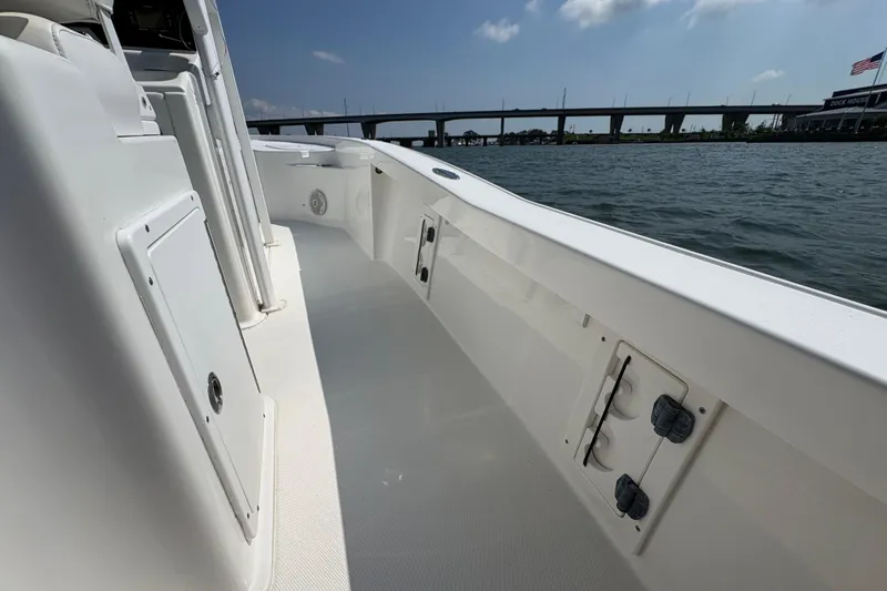 Slide: The Image of 2017 Sea Hunt BX 25 BR boat interior with water and bridge view. - 13