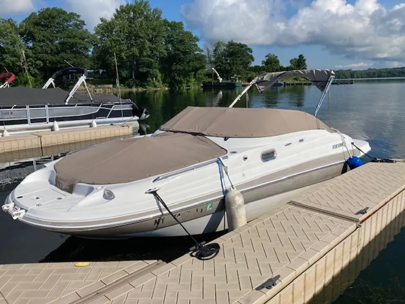 Slide: The Image of 2003 Four Winns 214 Funship at dock with cover and bimini top. - 8
