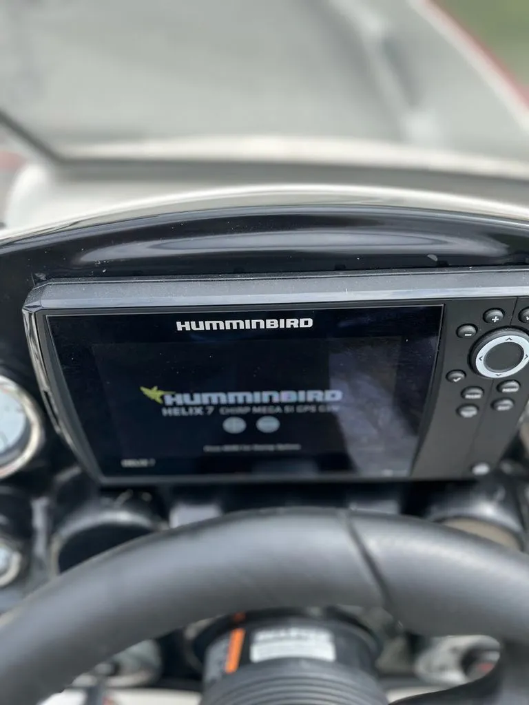 Slide: The Image of A Humminbird Helix 7 GPS device is mounted on a boat. - 4
