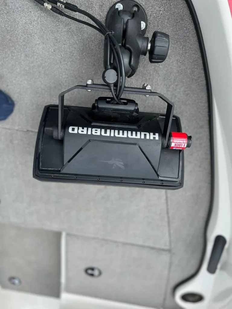 Slide: The Image of A Humminbird fish finder is mounted on the floor of a boat. - 9