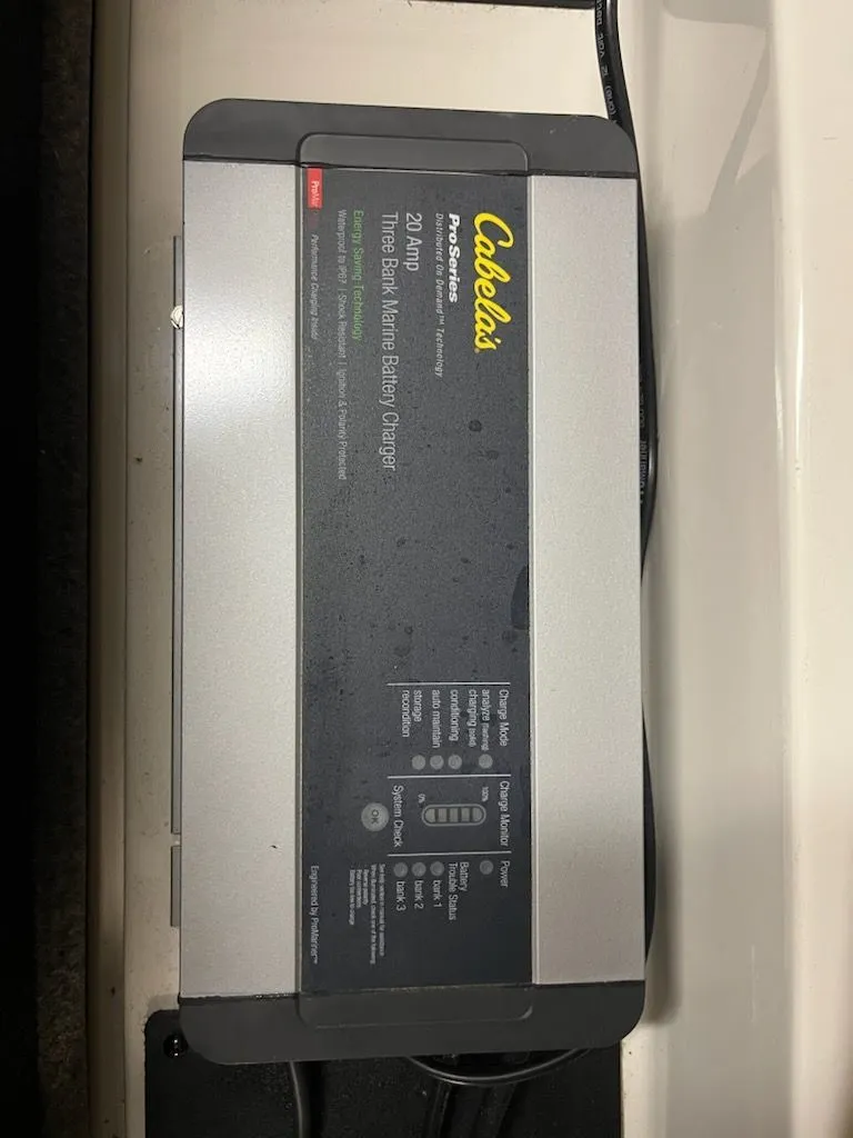 Slide: The Image of A Cabela's Pro Series 24V battery charger on a boat. - 15