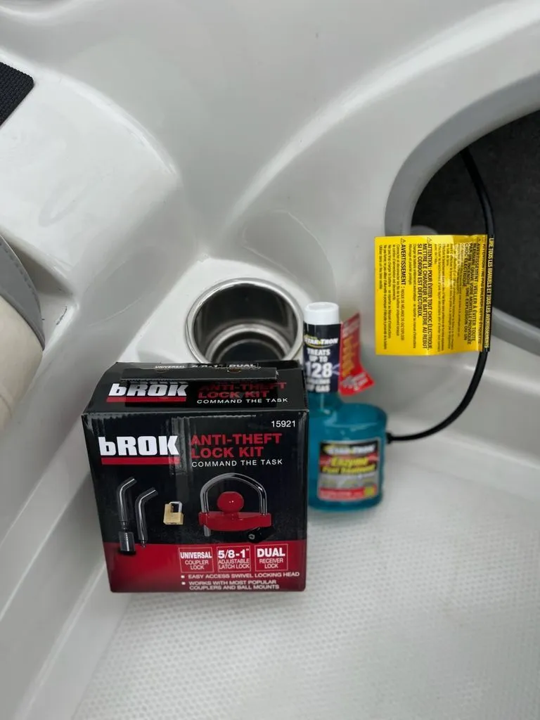 Slide: The Image of A Brok anti-theft lock kit and other products inside a boat. - 14