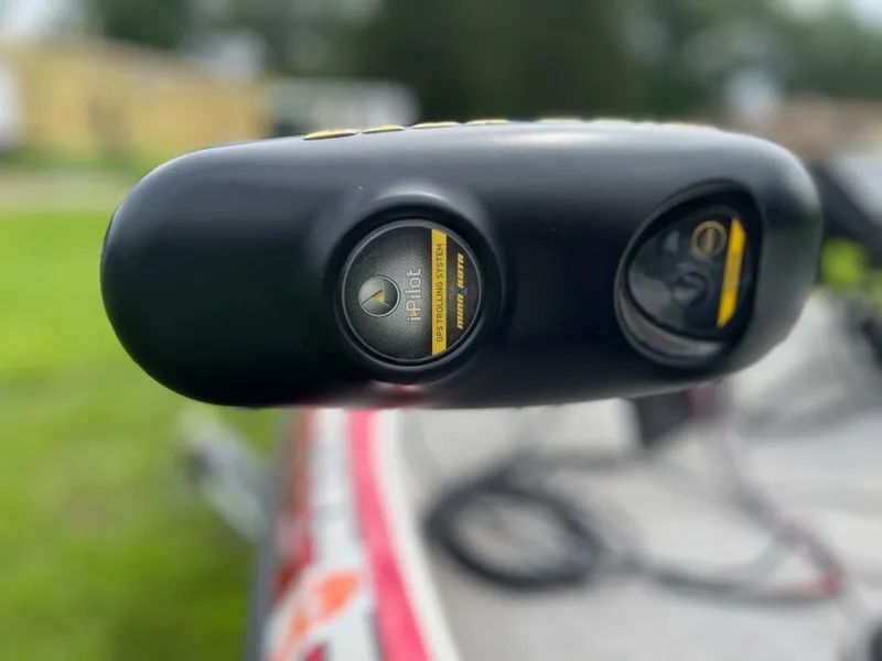Slide: The Image of Close-up of a boat control device with i-Pilot feature. - 21