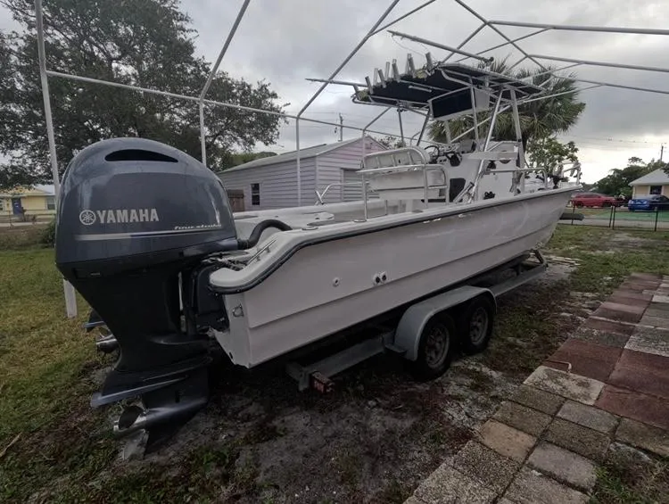Slide: The Image of 2004 Twin Vee 26 Center Console boat with Yamaha outboard on trailer. - 5