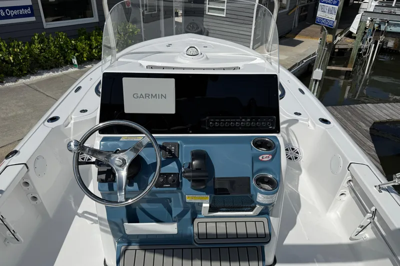 Slide: The Image of 2027 Tidewater 2110 Bay Max boat dashboard with Garmin navigation system. - 4