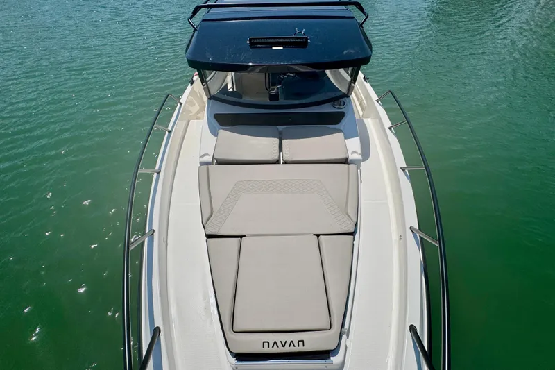 Slide: The Image of 2026 Navan C30 boat with sleek design and spacious deck on calm water. - 51