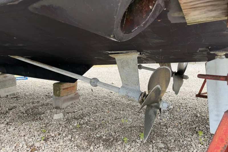 Slide: The Image of Propeller and rudder of 1998 Sabreline 36 Fast Trawler on dry dock. - 8