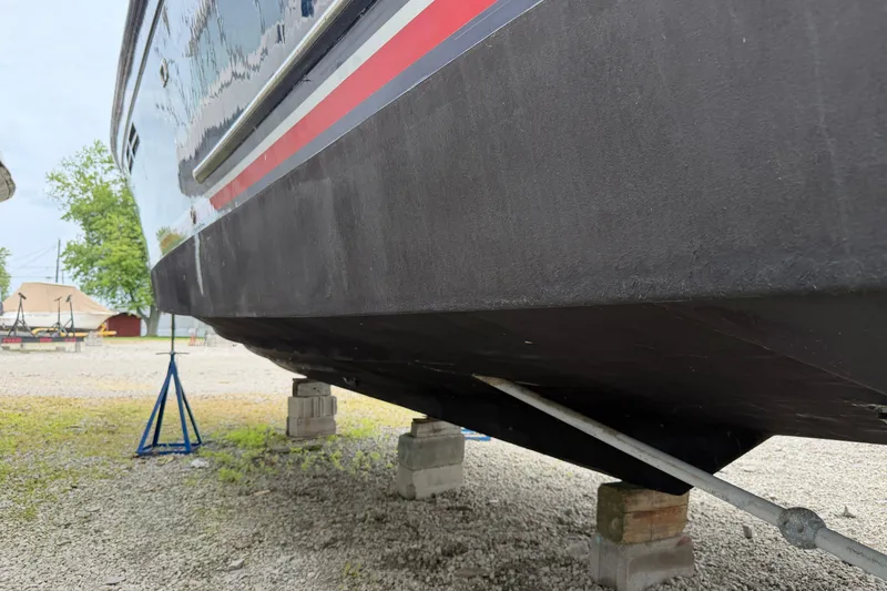 Slide: The Image of 1998 Sabreline 36 Fast Trawler on stands, showcasing hull and exterior details. - 9