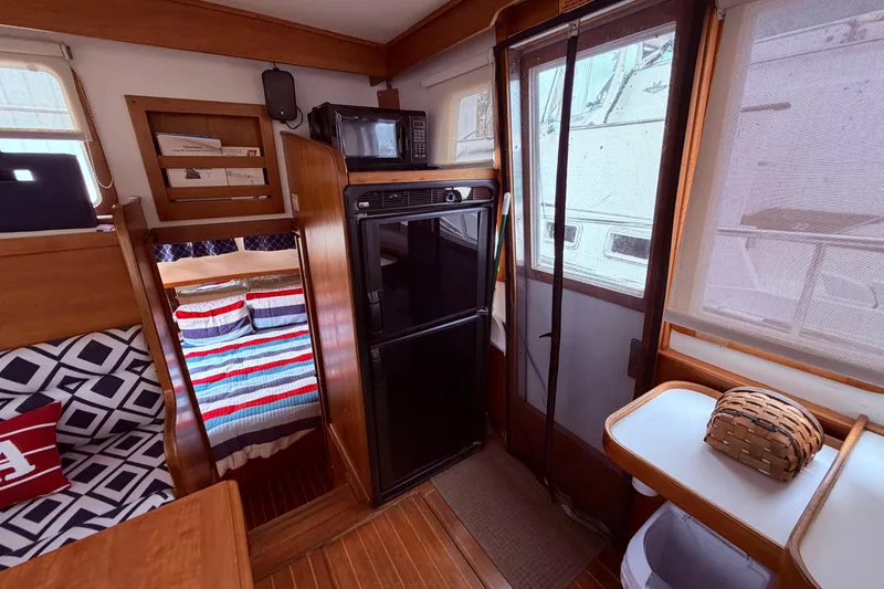 Slide: The Image of Interior of 1998 Sabreline 36 Fast Trawler with cozy cabin and kitchenette. - 20