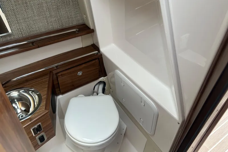 Slide: The Image of Luxurious bathroom interior of 2027 Solara S-250 Coupe with wood accents and modern fixtures. - 23