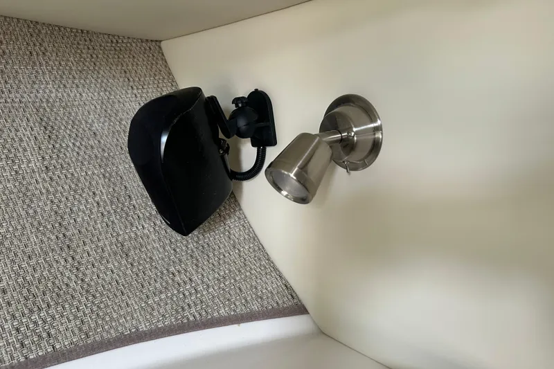 Slide: The Image of Interior of 2027 Solara S-250 Coupe with sleek wall-mounted light fixture. - 22