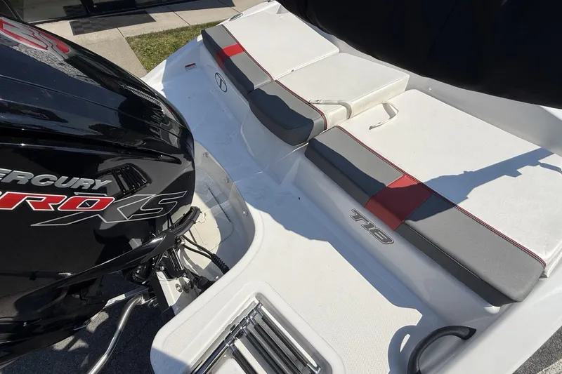 Slide: The Image of 2024 Tahoe T18 boat with Mercury Pro XS engine, featuring sleek seating and modern design. - 7