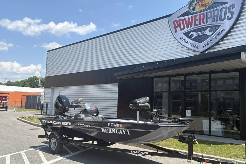 Slide: The Image of 2020 Tracker Pro 170 boat outside Power Pros Service Center on a sunny day. - 3