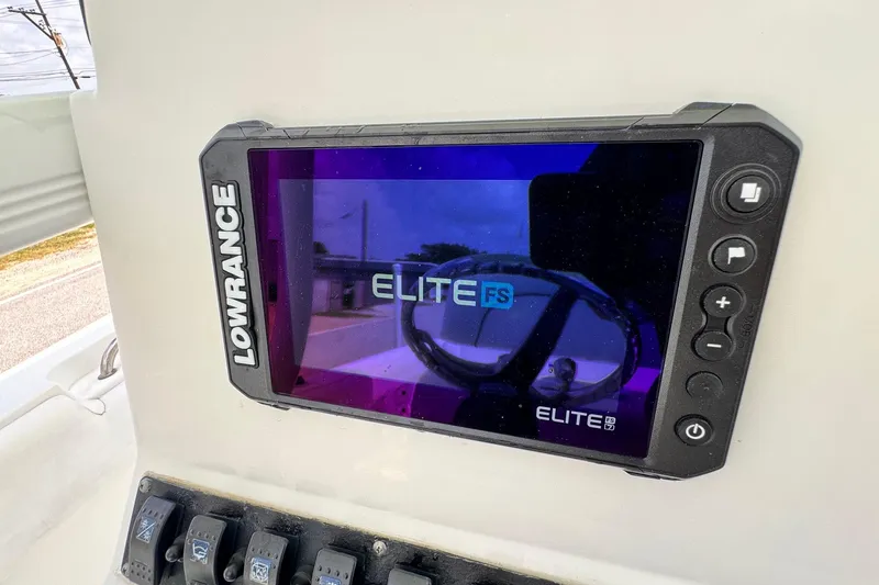 Slide: The Image of Lowrance Elite FS display on 2015 Sea Hunt Ultra 234 boat dashboard. - 17