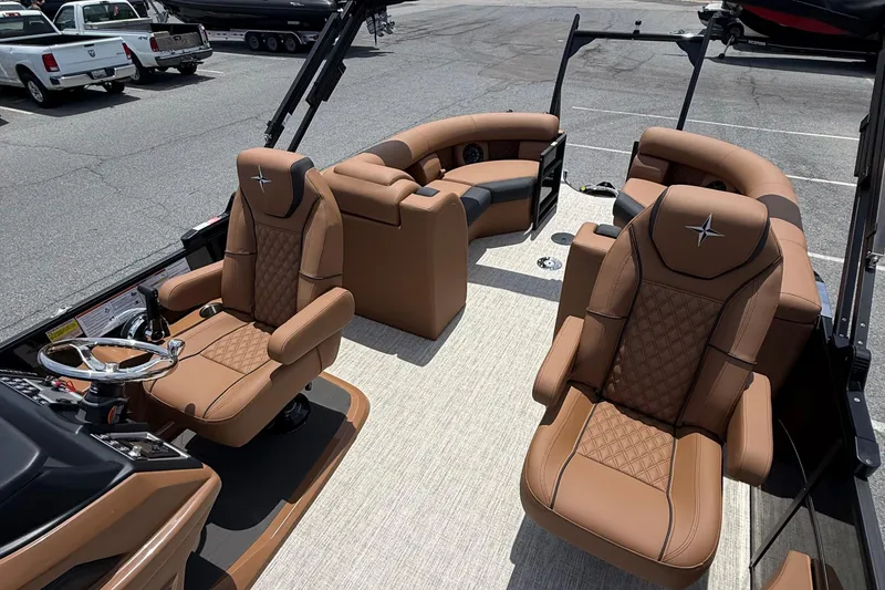 Slide: The Image of Luxurious interior of 2026 Berkshire 23RFX STS pontoon boat with plush seating. - 9