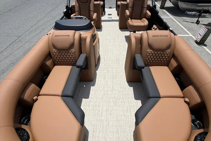 Slide: The Image of Luxurious interior of 2026 Berkshire 23RFX STS pontoon boat with tan leather seating. - 8