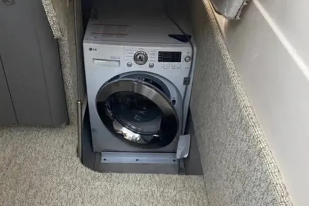 Slide: The Image of Washer installed in 2007 Sea Ray 44 Sedan Bridge yacht interior. - 15