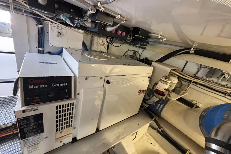 Slide: The Image of Engine room of 2005 Hatteras 50 Convertible with Onan marine generator. - 32