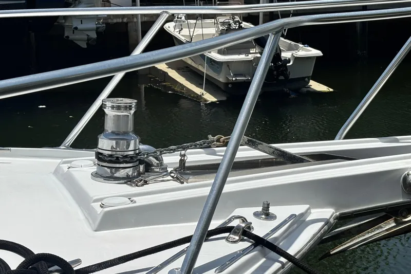 Slide: The Image of Bow of 2005 Hatteras 50 Convertible yacht with anchor and winch system. - 5
