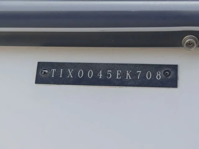 Slide: The Image of Close-up of a serial number on a boat. - 30