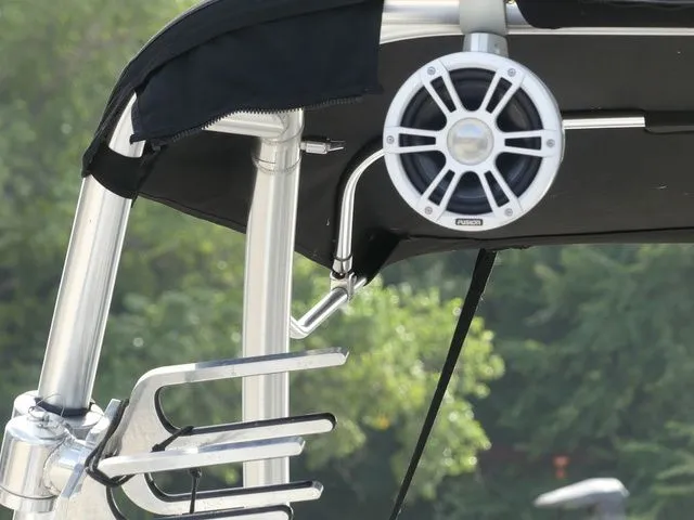 Slide: The Image of Close-up of a speaker and wakeboard rack on a boat. - 32